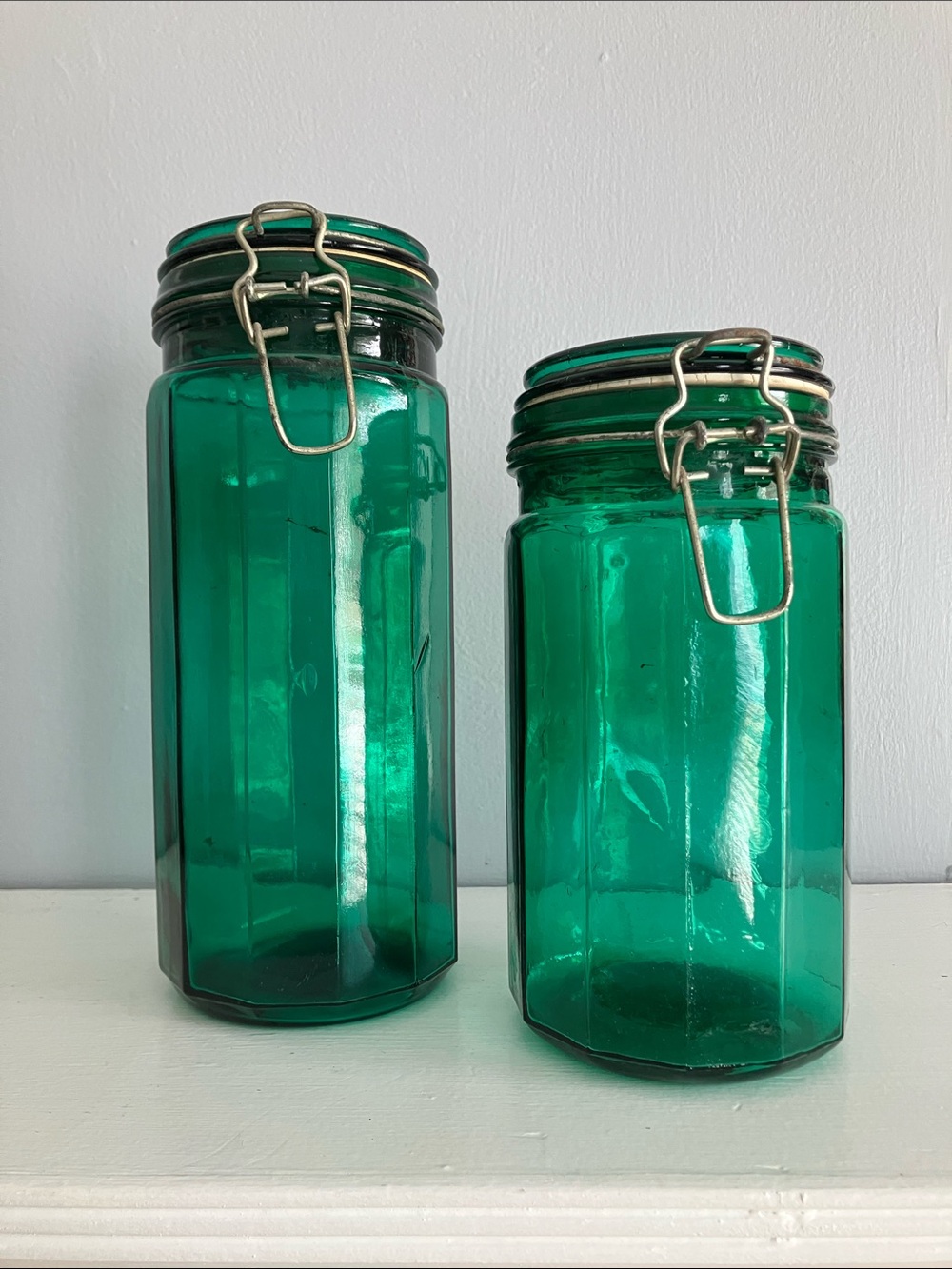 Pair of Vintage Green Teal Glass Paneled Canisters